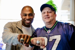 Seahawk's great Shaun Alexander letting fans wear his championship rings  